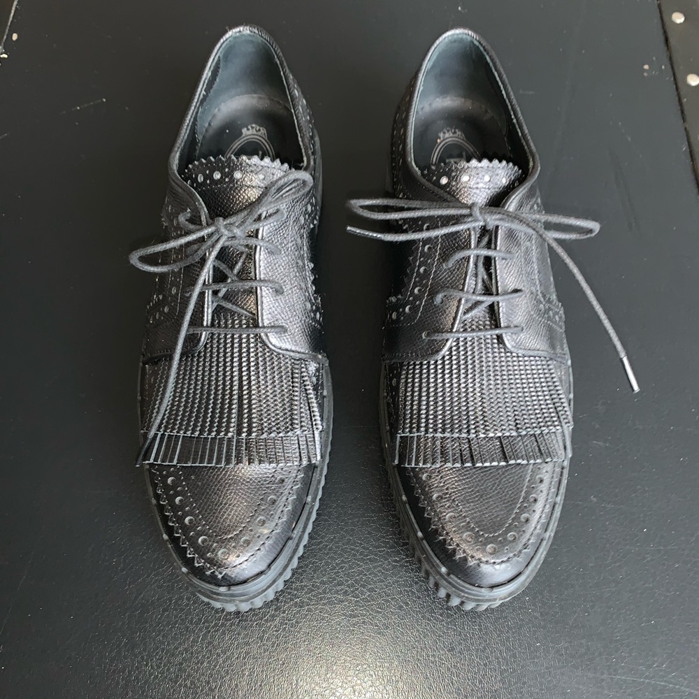 Tod’s Black Leather Loafers